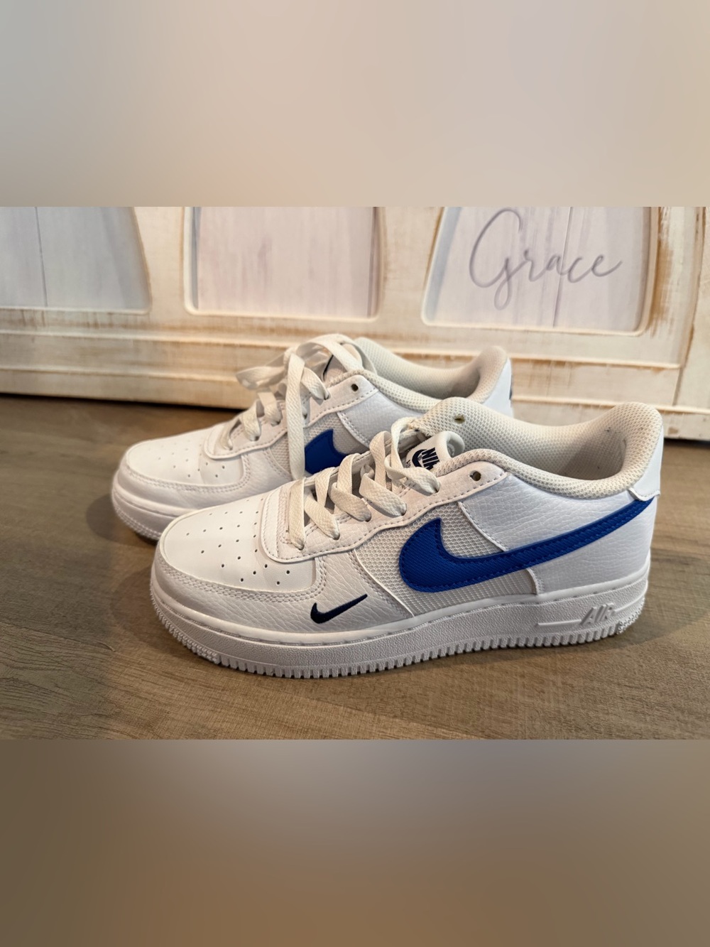 Nike Kids White Sneakers with Blue Swoosh